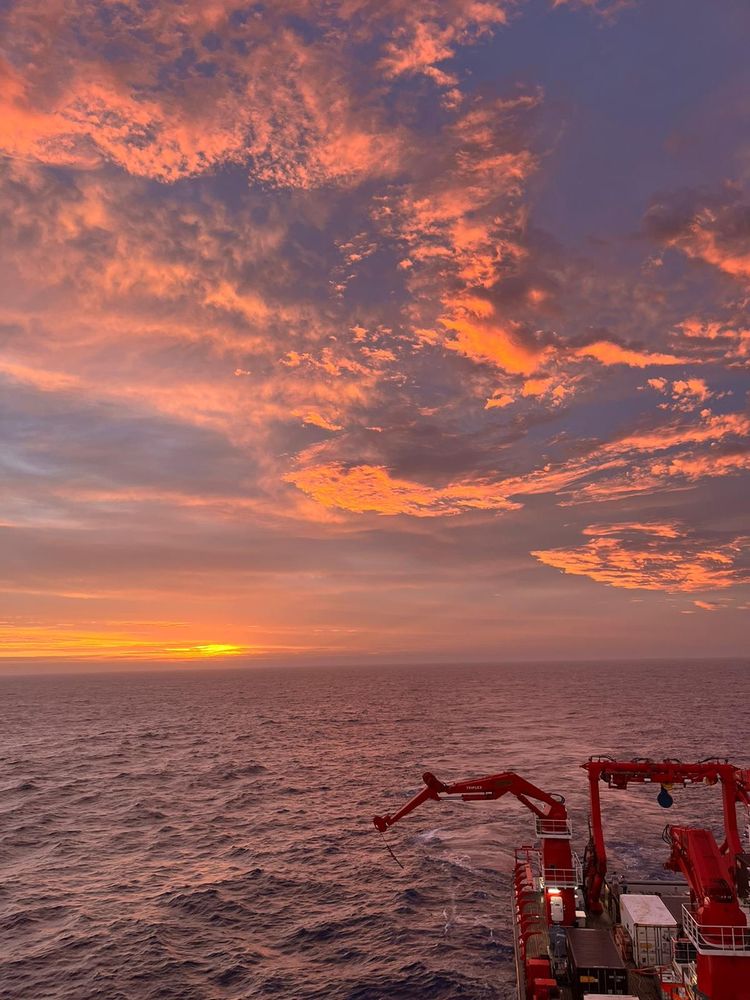 Sunset off a boat in the choppy Indian Ocean 