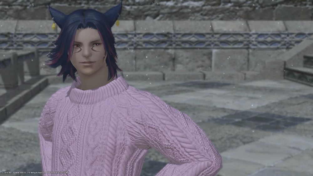 Koh'sae in Ishgard (Foundation) in a lotus pink cable knit sweater. His blue hair is swaying in the breeze.