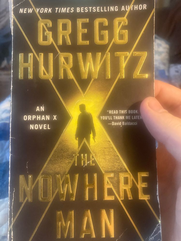 Picture of a used trade paperback copy of the Gregg Hurwitz novel “Nowhere Man,” part of the Orphan X series.