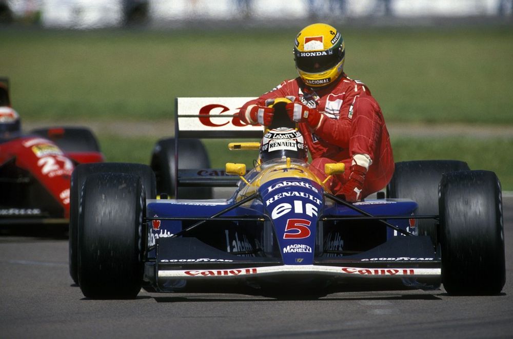 Grand Prix de Grande-Bretagne disputé le 14 juillet 1991, remporté par Nigel Mansell (qui prend ici Ayrton Senna en stop), sur Williams-Renault-Elf. Une autre version du bleu-blanc-rouge.