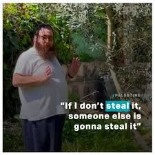 Picture of an illegal settler claiming if he does not steal the house that belongs to a Palestinian family then another illegal settler will. 