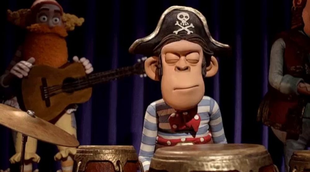 a cartoon monkey wearing a pirate hat and crossbones on it