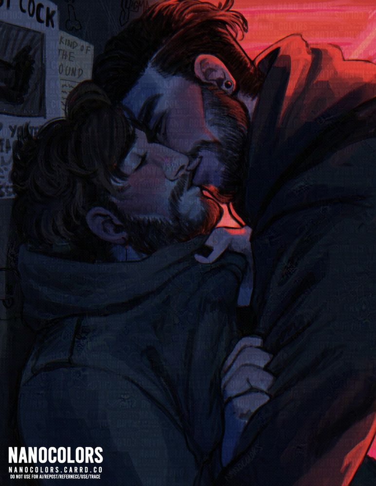 Two men kissing in what seems to be a backroom.