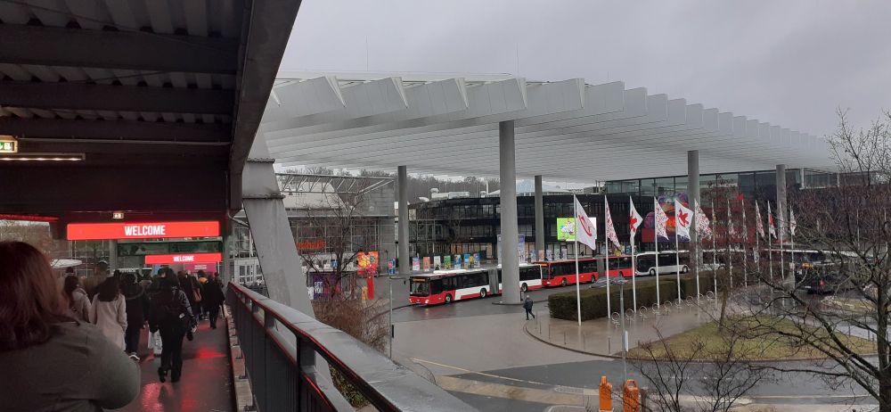 A landscape view of the front of the Nürnberg Messe grounds, where the International Toy Fair takes place. It's a rainy, foggy morning.