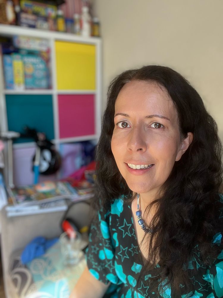 A selfie of me. I’m dressed up, hair down.