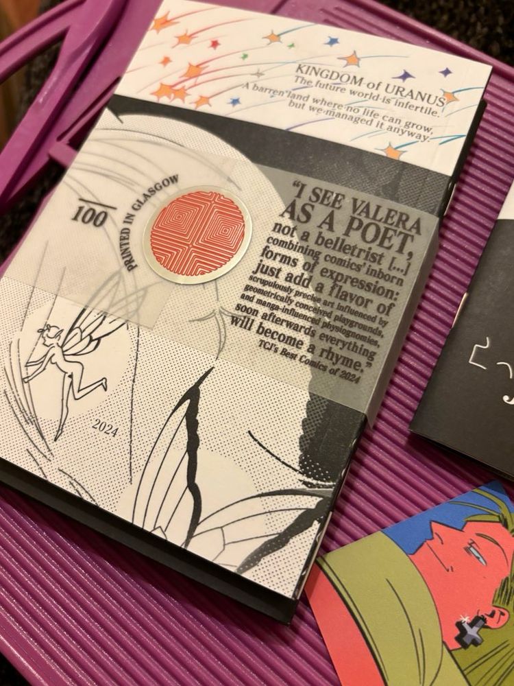 Back cover of Kingdom of Uranus showing the back of the vellum obi, which features a quote from TCJ’s review of the collection from 2024. 