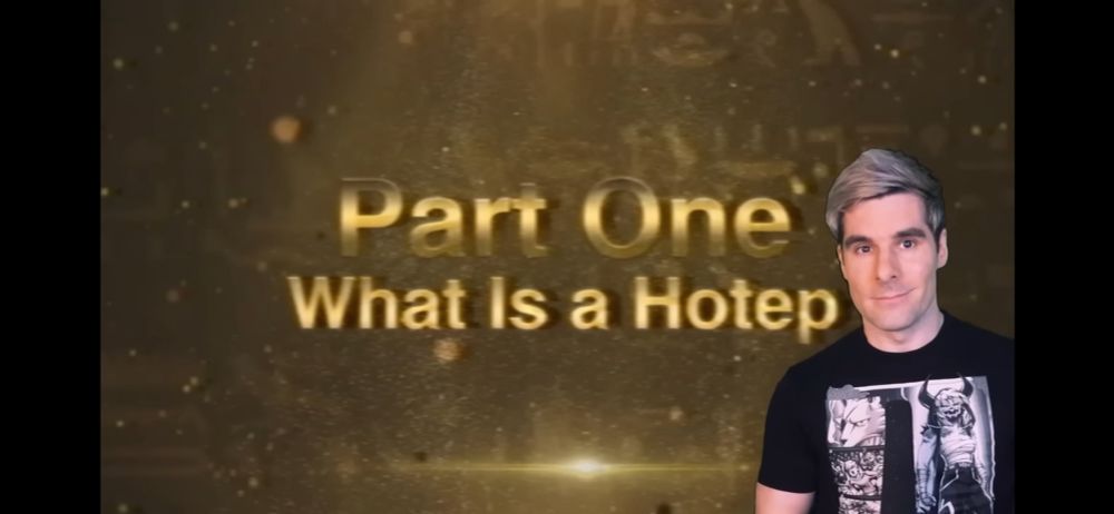 A screenshot of the FD Signifier video on Hoteps where SuperEyePatch wolf, a white Irish dude, is in front of the text "Part One: What is a Hotep" Looking deeply uncomfortable.