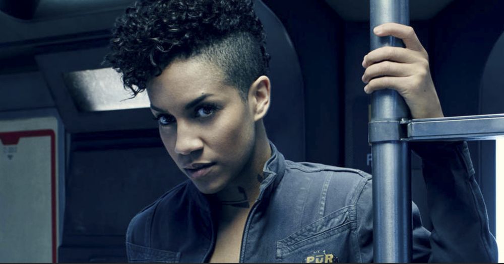 Naomi Nagata, from The Expanse. I think this is a promo still from Season 1. She's in her Pur & Clean boiler suit.