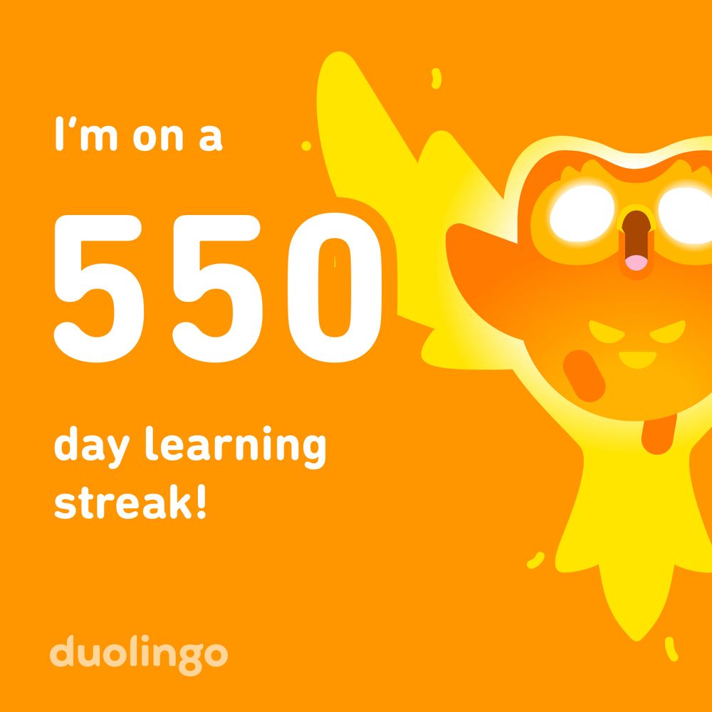 Image shows an orange Duolingo mascot on an orange background with the number 550 and the words day learning streak