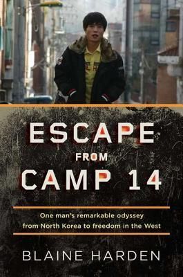 A New York Times bestseller, the shocking story of one of the few people born in a North Korean political prison to have escaped and survived.

North Korea is isolated and hungry, bankrupt and belligerent. It is also armed with nuclear weapons. Between 150,000 and 200,000 people are being held in its political prison camps, which have existed twice as long as Stalin's Soviet gulags and twelve times as long as the Nazi concentration camps. Very few born and raised in these camps have escaped. But Shin Donghyuk did.

In Escape from Camp 14, acclaimed journalist Blaine Harden tells the story of Shin Dong-hyuk and through the lens of Shin's life unlocks the secrets of the world's most repressive totalitarian state. Shin knew nothing of civilized existence-he saw his mother as a competitor for food, guards raised him to be a snitch, and he witnessed the execution of his own family. Through Harden's harrowing narrative of Shin's life and remarkable escape, he offers an unequaled inside account of one of the world's darkest nations and a riveting tale of endurance, courage, and survival.