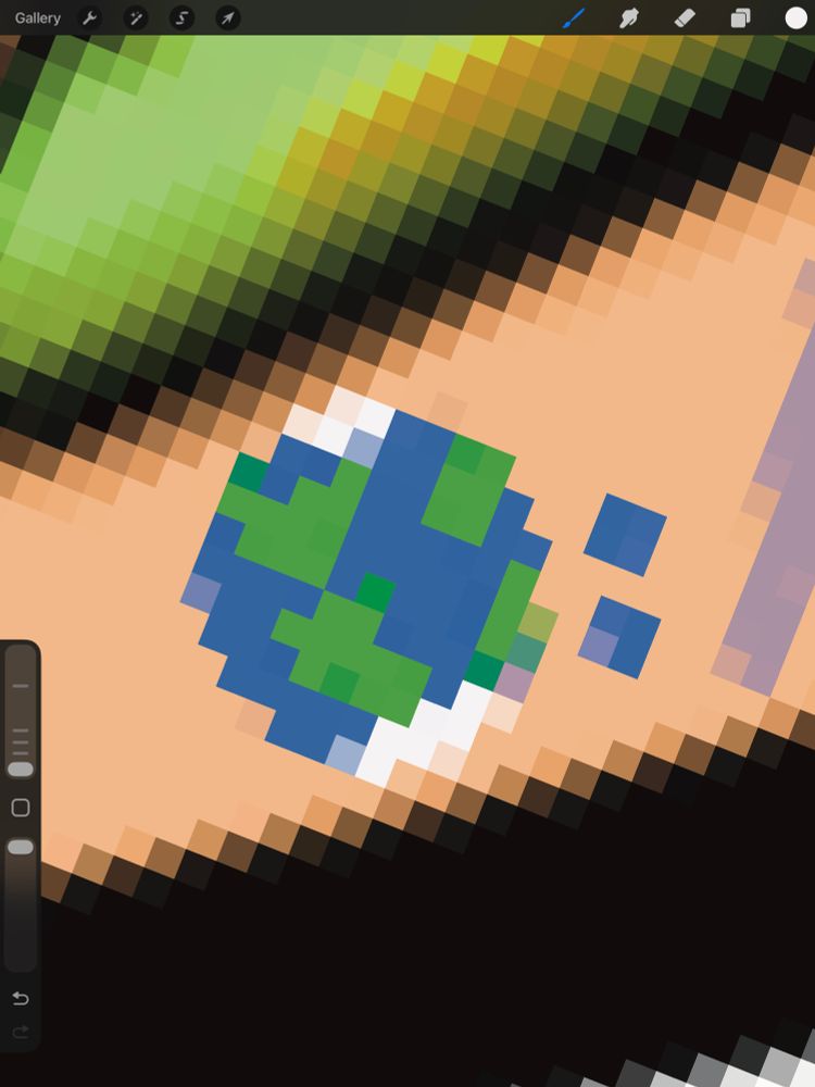 A small pixellated icon of the planet earth, painted on an in-progress sticker as a World Wide Web logo