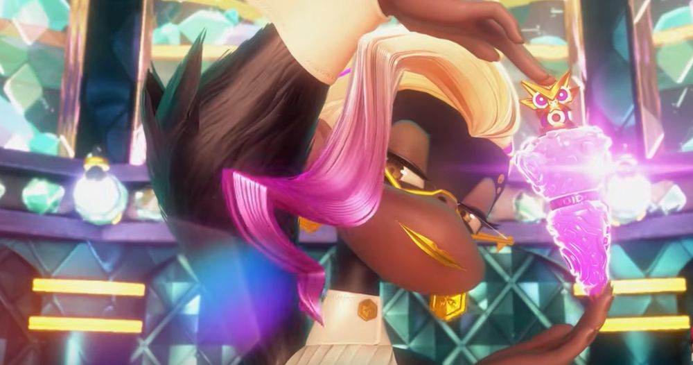 screenshot of a femme moneky character from the donkey kong bananza trailer. she has blonde hair with a dyed-pink cowlick. she wears a conductor's uniform accessorized with gold half-rim glasses, gold lipstick, and gold hexagonal earrings. she holds a weird magic item that looks like a pink perfume bottle.