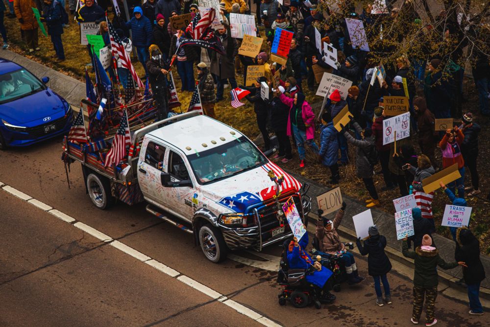 Hands off protesters impede counter protester 