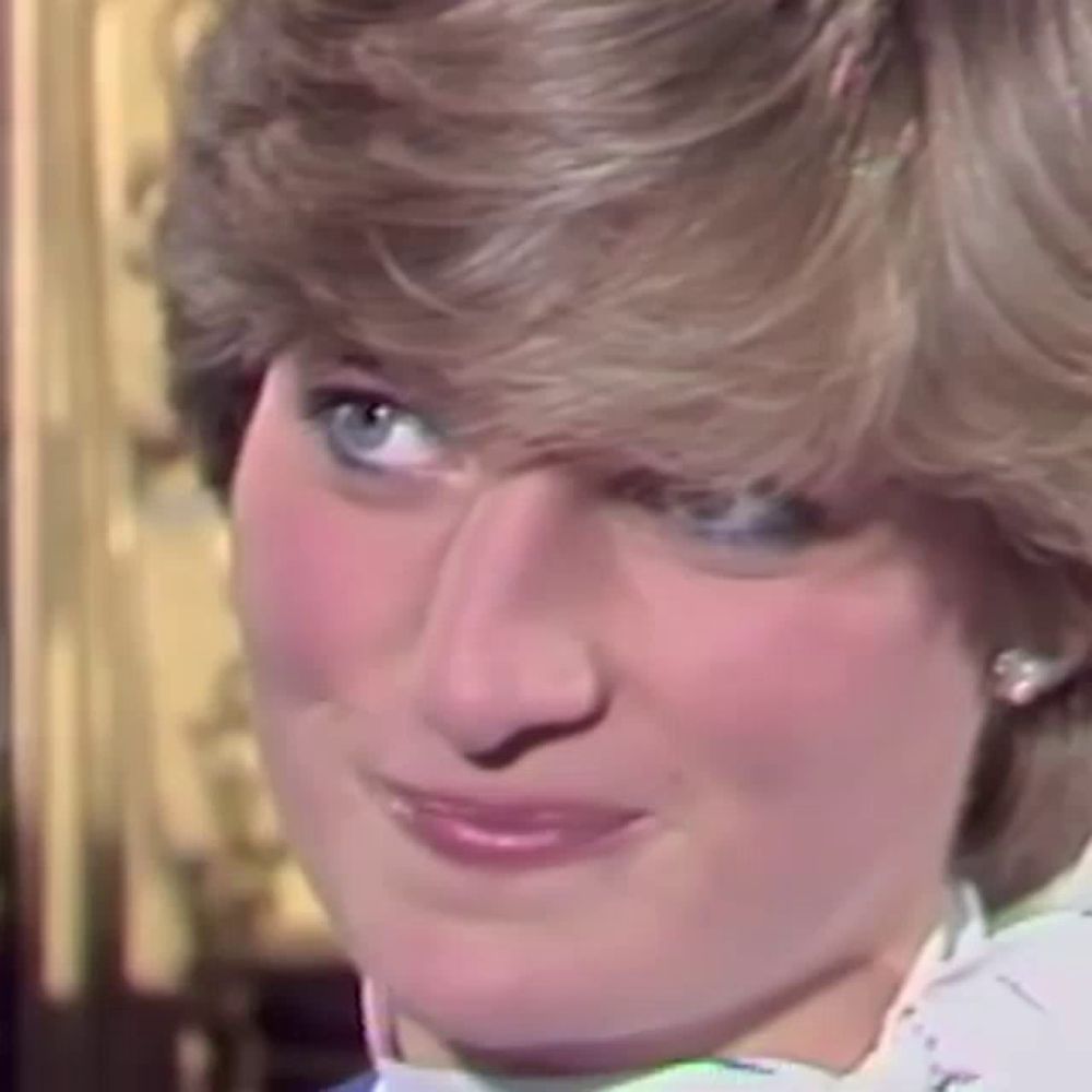 a close up of princess diana making a funny face