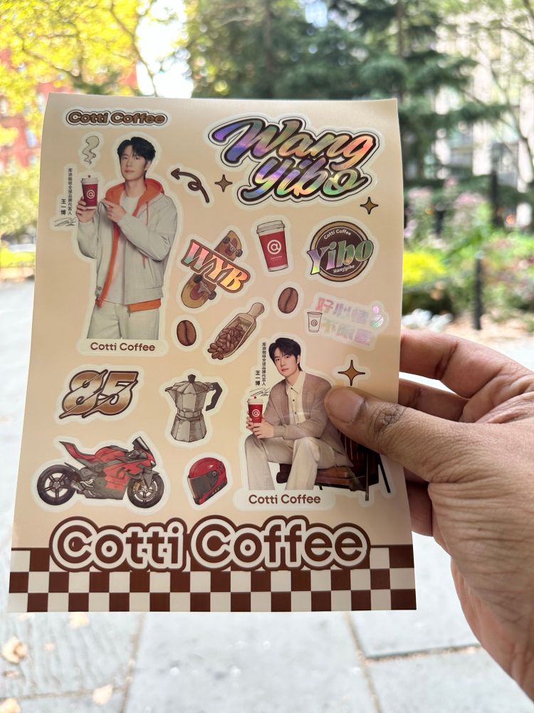 Cotti Coffee Yibo stickers with his name, red motorcycle, red helmet, skateboard, etc.