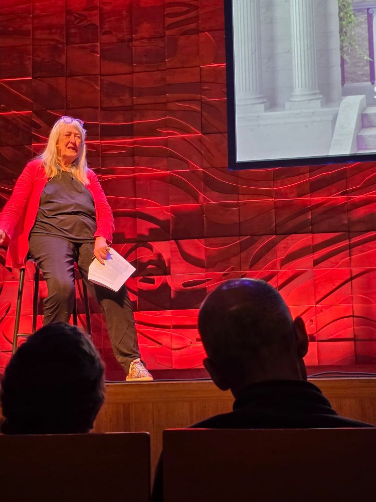 Professor Mary Beard having a seat as she finishes part 1 of her talk about the Romans in Melbourne