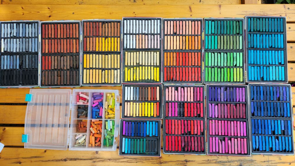 Trays of assorted color chalk pastels