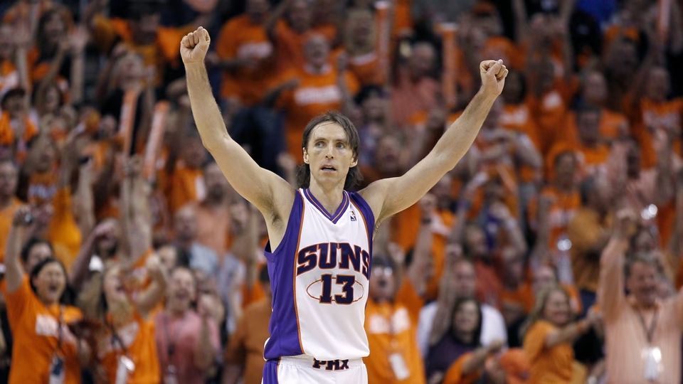 MVSteve Nash - Suns (home white) - fists in air, celebrating team's win over the Lakers during the final seconds of Game 3 of the NBA WC Finals in Phoenix: May 23, 2010. (Lucy Nicholson/Reuters)