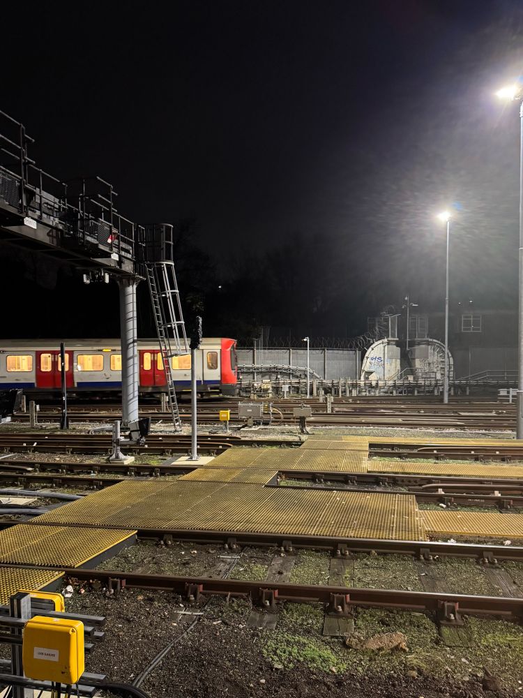 Uxbridge Sidings, with a Metropolitan line train in the distance shunting out. Taken from a place of safety. 