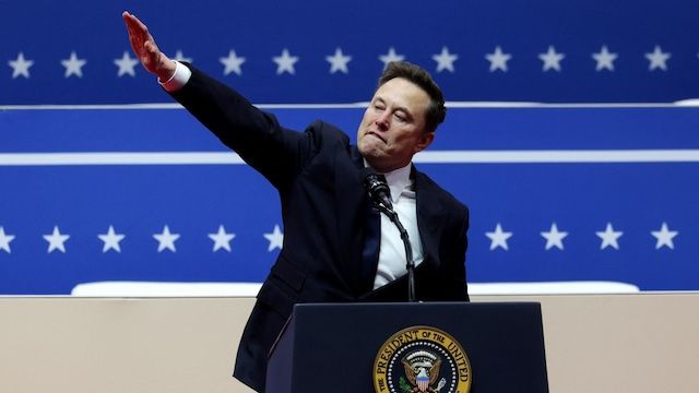 Picture of Elon Musk throwing up a Nazi salute at a podium bearing the Presidential seal and with stars in the background from the Inauguration in January.