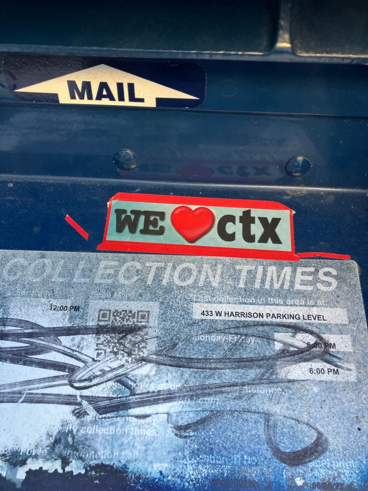 A sticker on a postal mail box that say ‘we heart CTX’.
