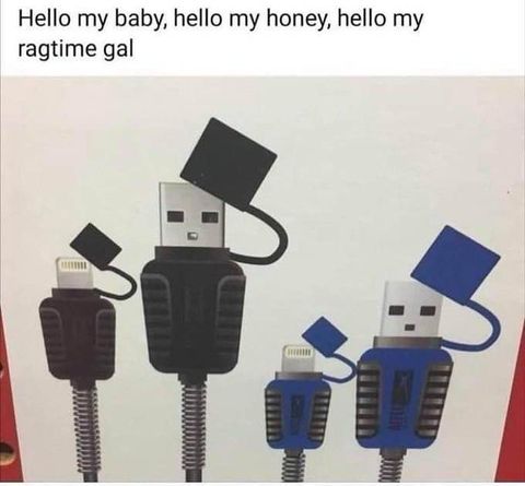 Four charging plugs with plastic caps.  The plastic caps resemble top hats.  The caption says "Hello my baby, hello my honey, hello my ragtime gal"
