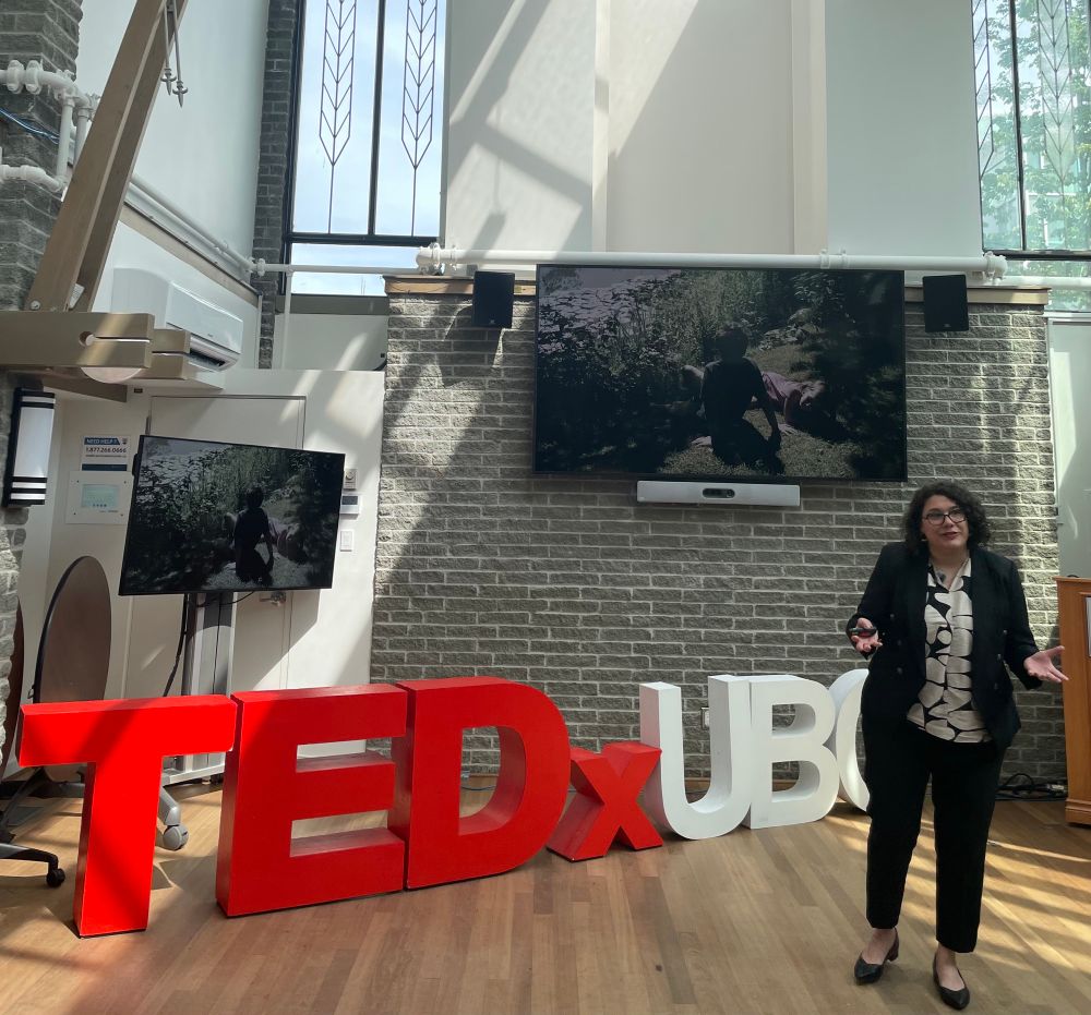 Woman giving TED talk