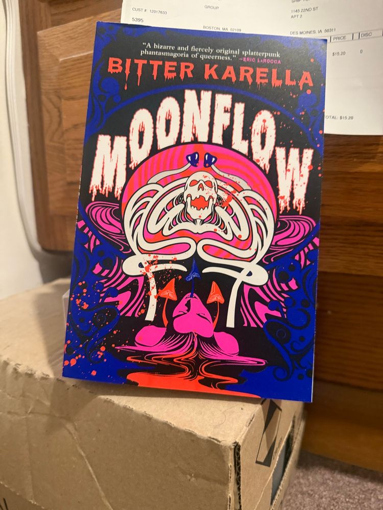 Paperback copy of MOONFLOW by Bitter Karella, published author and certified goblin. 