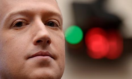 Close up of Mark Zuckerberg's face, no expression, emotionless.