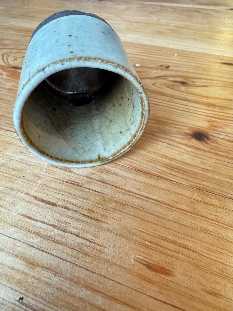 On the wooden table rest a forswunken ceramic cup. 

My forswunken self is tired
It tried to fill me up
But alas I still feel mired 
Now so does my little cup