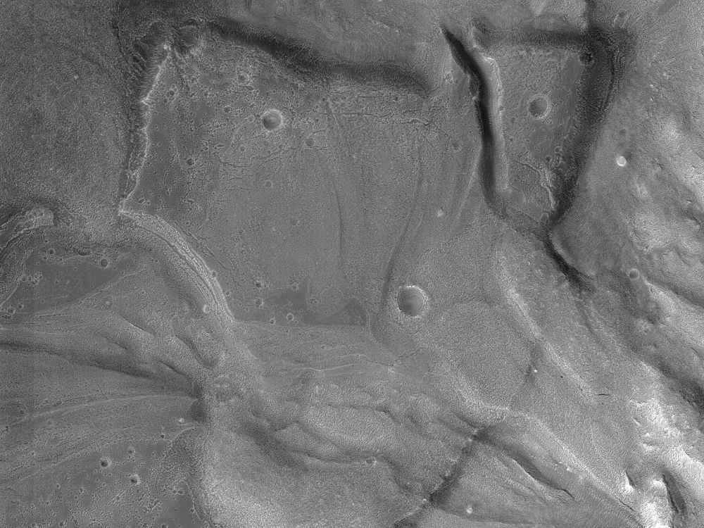 Image shows what either is a large delta or a possible sedimentary fan on the surface of Mars. (NASA/JPL-Caltech/University of Arizona)
