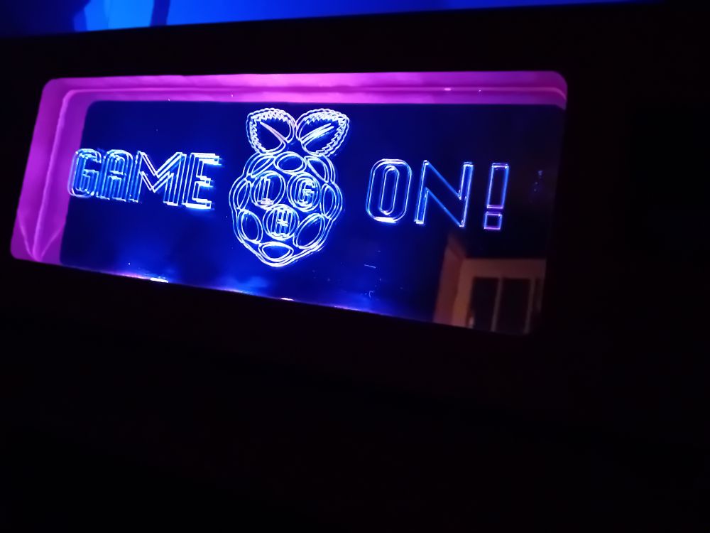 Cabinet marquee with "game on"