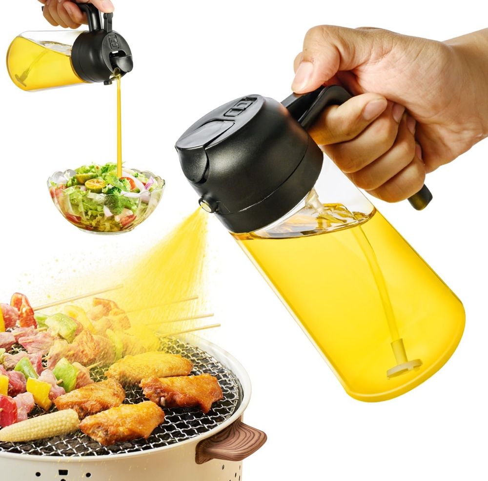 A glass bottle filled with liquid with a spray top for applying oil to food