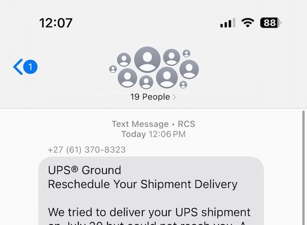 a screenshot of a text message, which claims to be a UPS Ground redelivery notice but is obviously a scam text. There are 19 people on this text message chain.