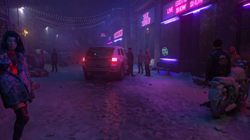 Vampire: The Masquerade – Bloodlines 2 screenshot of a snow-covered Seattle street at night. 