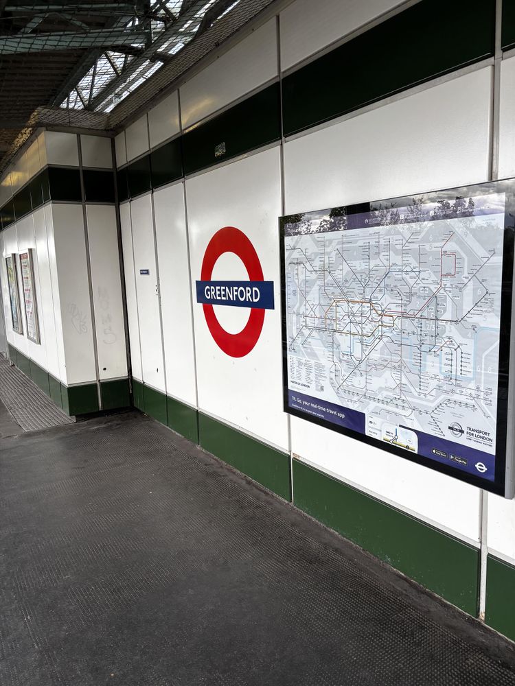 Greenford Tube station roundel sign and network map