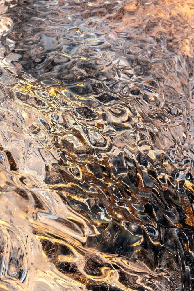 Abstract Ice Art with Golden Reflections 