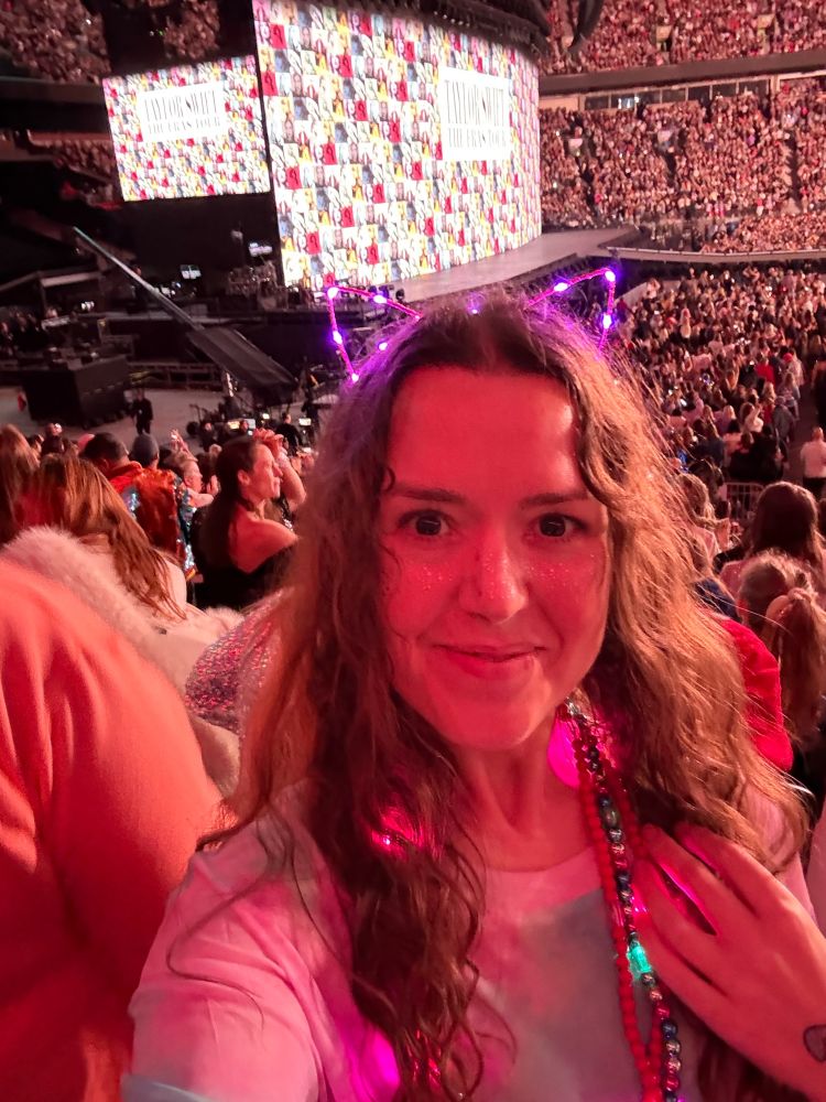 Selfie of a woman at the Taylor Swift Eras Tour