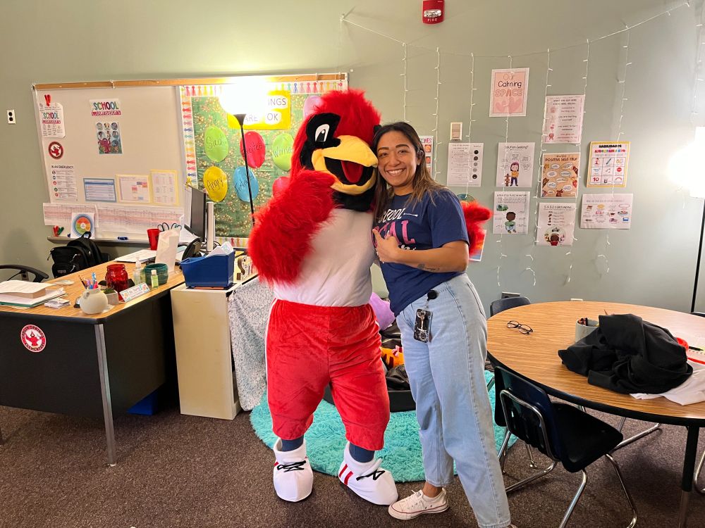Our school social worker, Ms. Coleto, and our Carlin Springs school mascot, "Cardi-C".