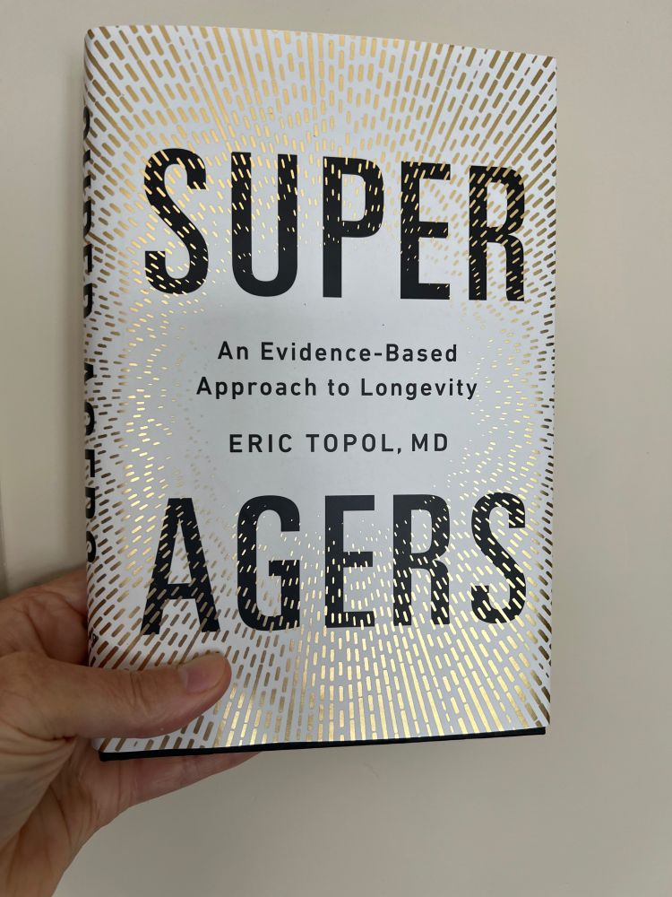 holding my new book SUPER AGERS 