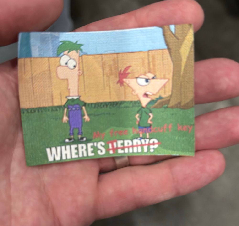 A coupon for a free handcuff key from Defcon's physical security village after escaping from handcuffs within 30 seconds when handcuffed with your hands behind your back