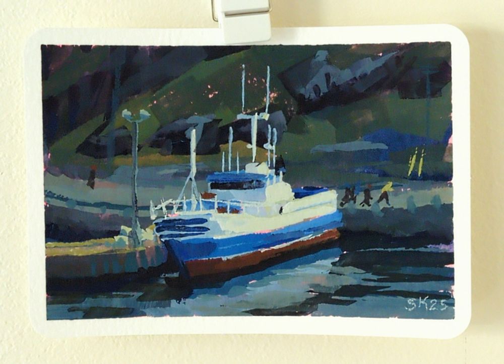 A photograph of a small gouache painting of a boat in dock at a small pier, white against a dark green slope that hides the sky. Tiny figures including one in a yellow sou'wester are walking on the quay behind it.