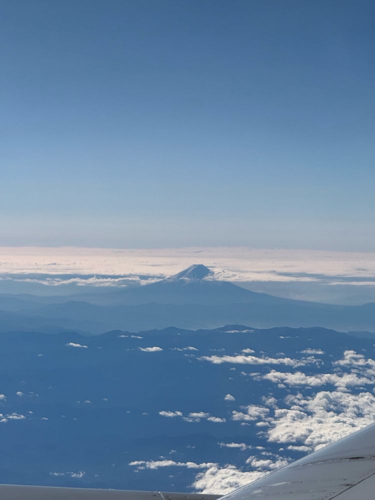 Mount Fuji peaks above the clouds