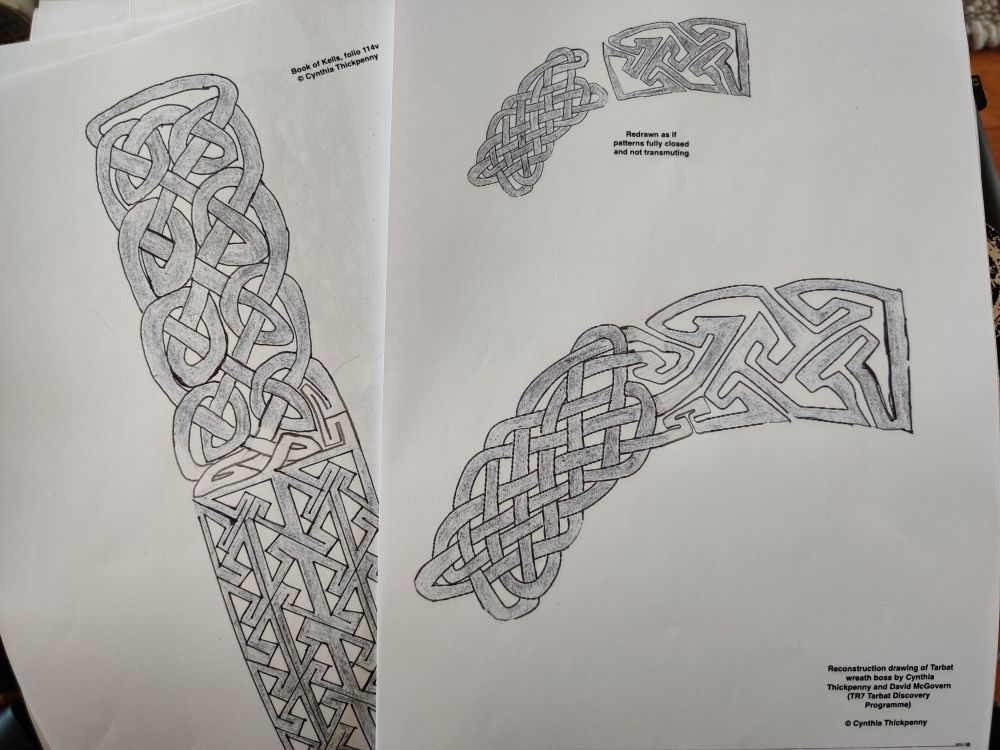 worksheets showing areas of knotwork and areas of key pattern, with pencil drawn connections between them