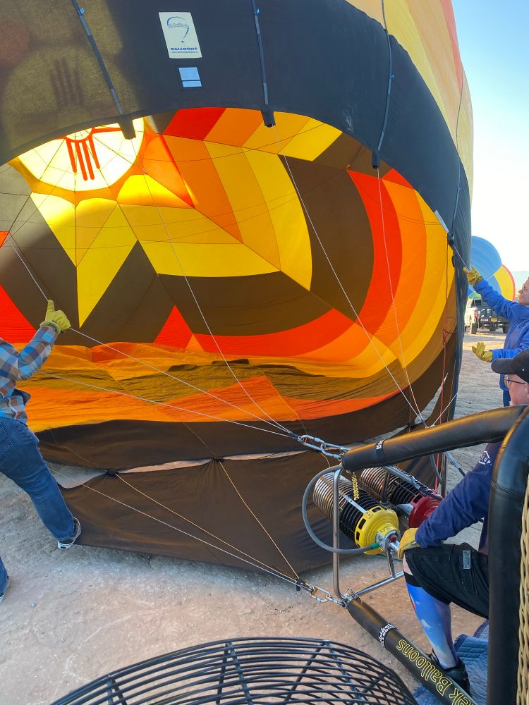 Inflating a hot air balloon with fan. 