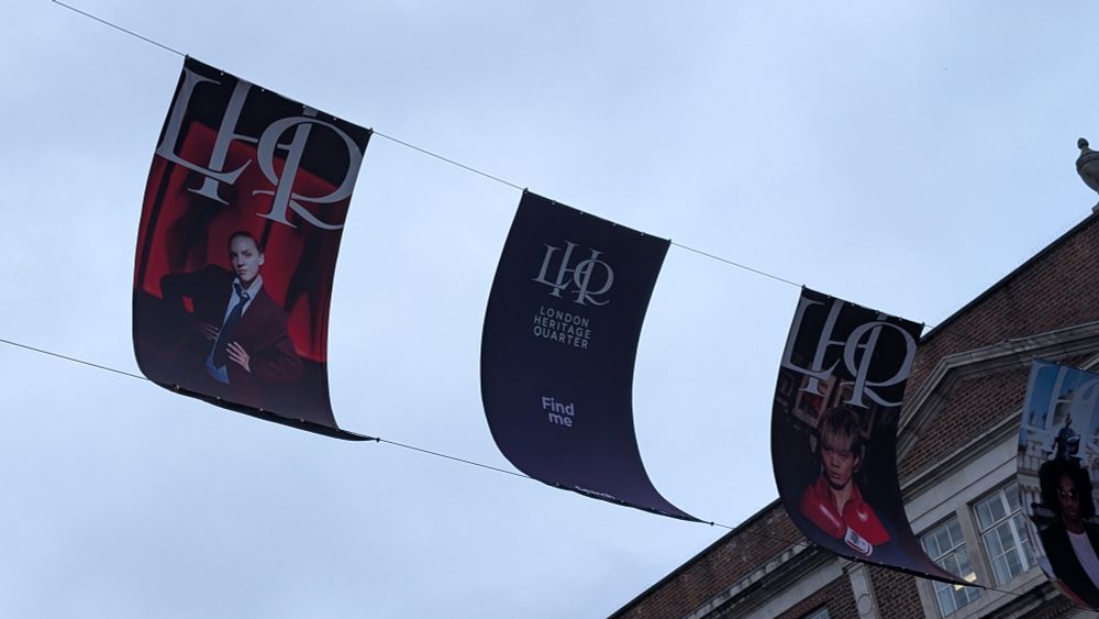 Flags saying "London Heritage Quarter" 