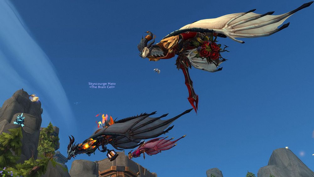 A diving Dracthyr squadron from World of Warcraft