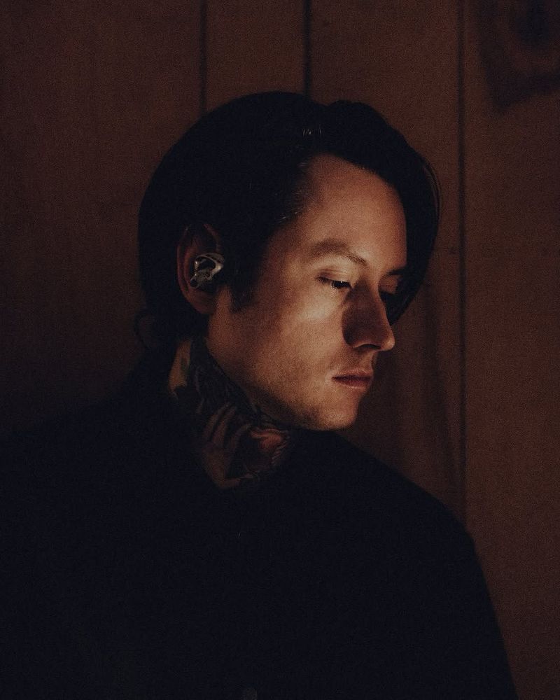 A side profile shot of Noah Sebastian 