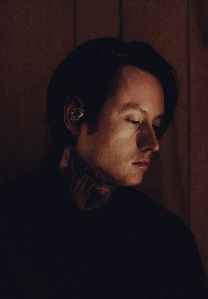 Noah Sebastian at a slight side profile. He’s super pretty. 