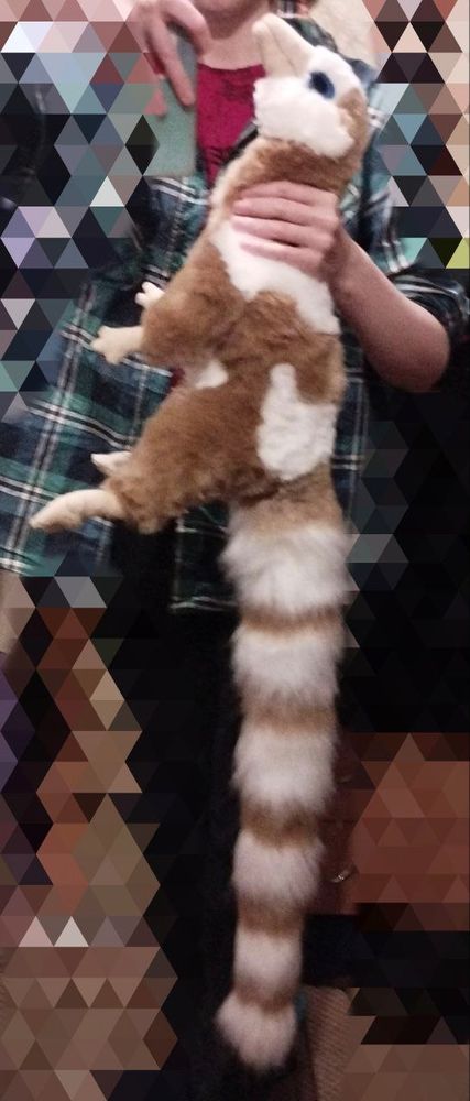 A life-sized plush toy of the creatures